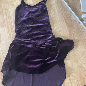 Purple figure skating with subtle detailing and glitter